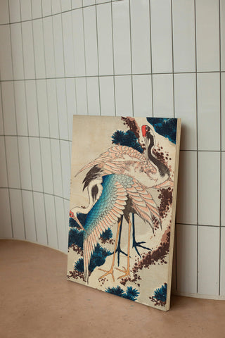 Cranes on snow-covered pine Print