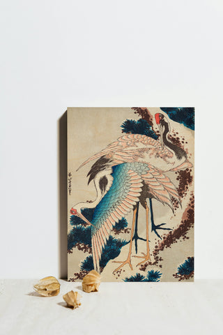Cranes on snow-covered pine Print